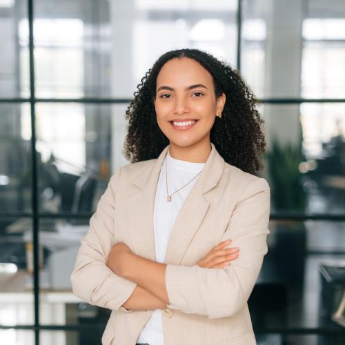 Business Woman Standing With Arms Crossed